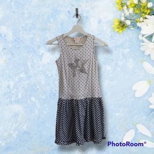Star and polka dotted dress, size 12